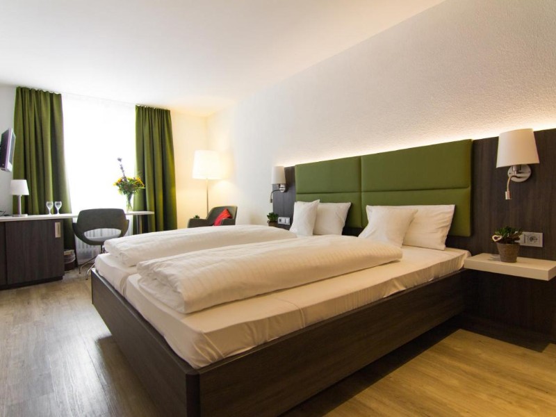 Een hotelkamer van Insel Hotel Lindau aan de Bodensee